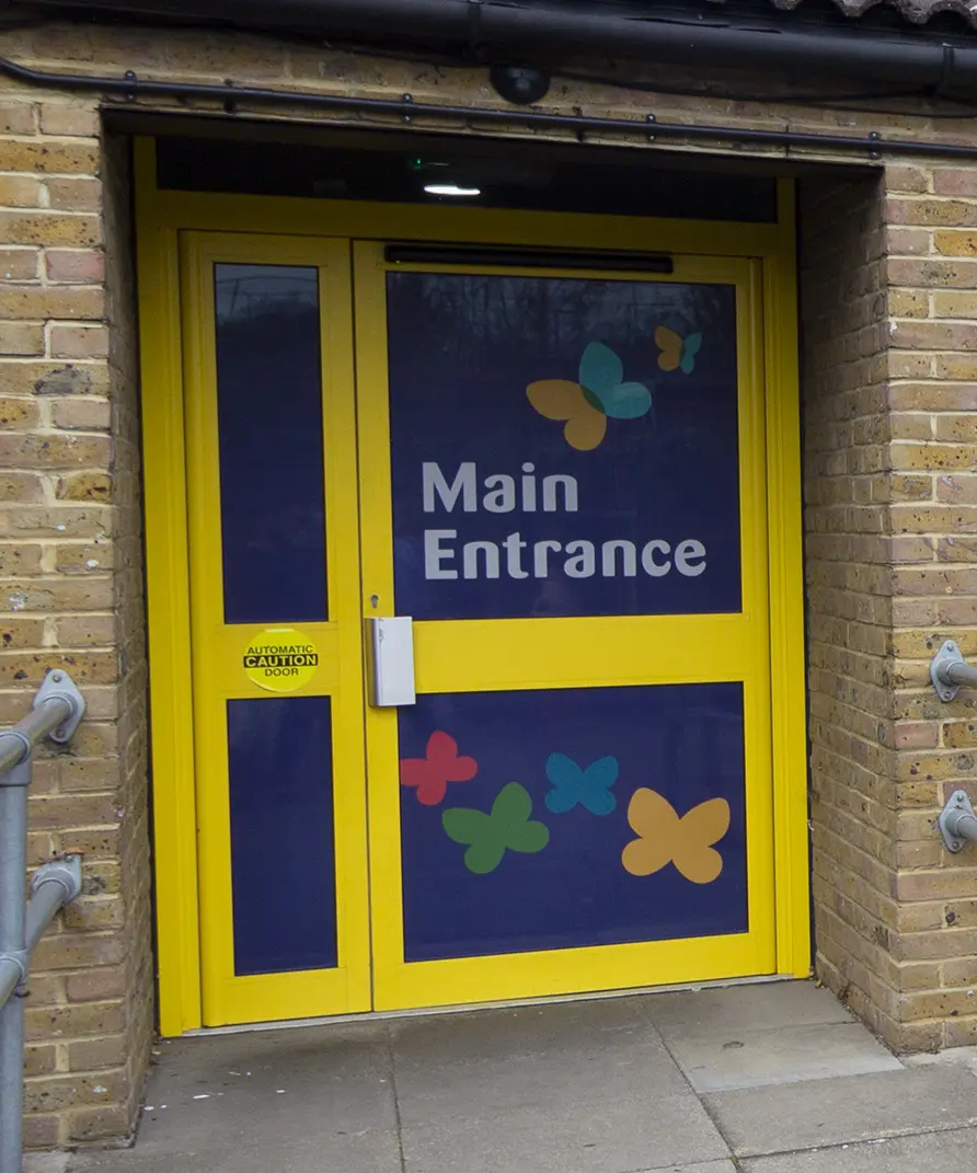 Dairy Meadow school bespoke branding exterior entrance wall art