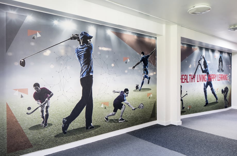 Summer Fields Oxford inspiring sports theme entrance wall art